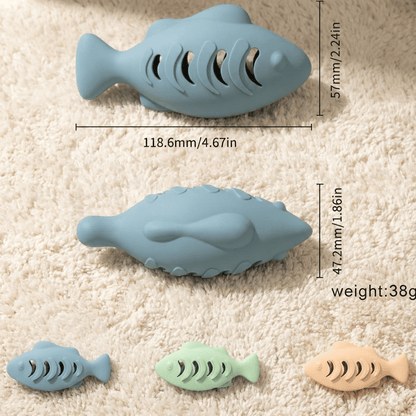 StayPurr Blue fish-shaped silicone cat toy with measurements and weight on a carpet